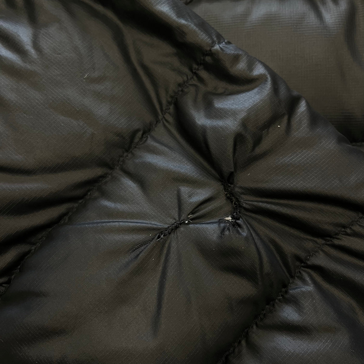 The North Face N2 Black Puffer Jacket WITH REPAIR