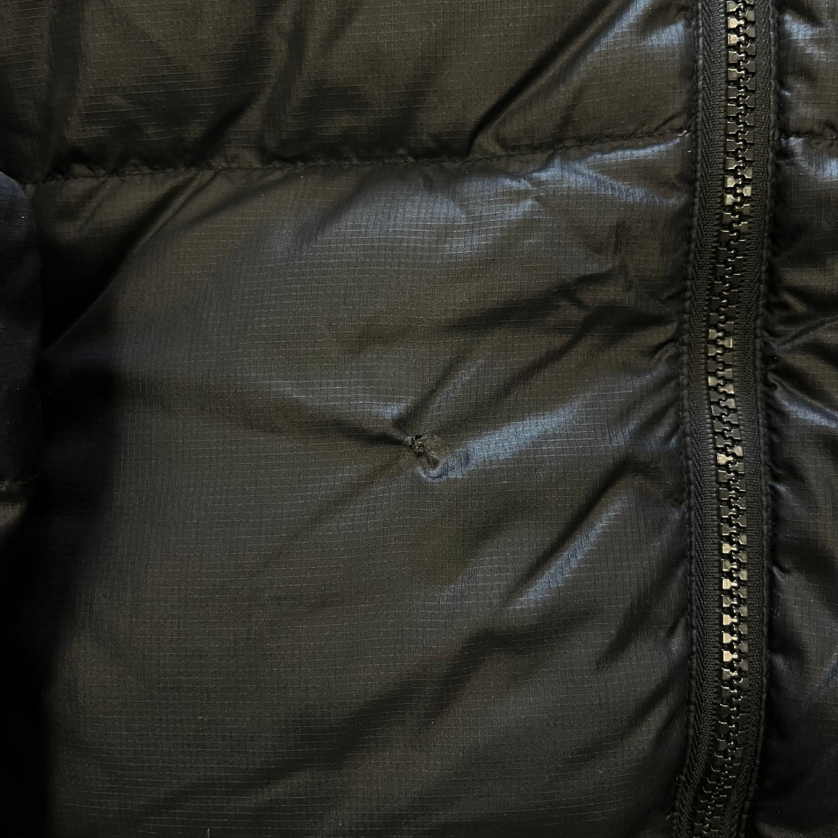 The North Face Black Puffer Jacket WITH REPAIRS