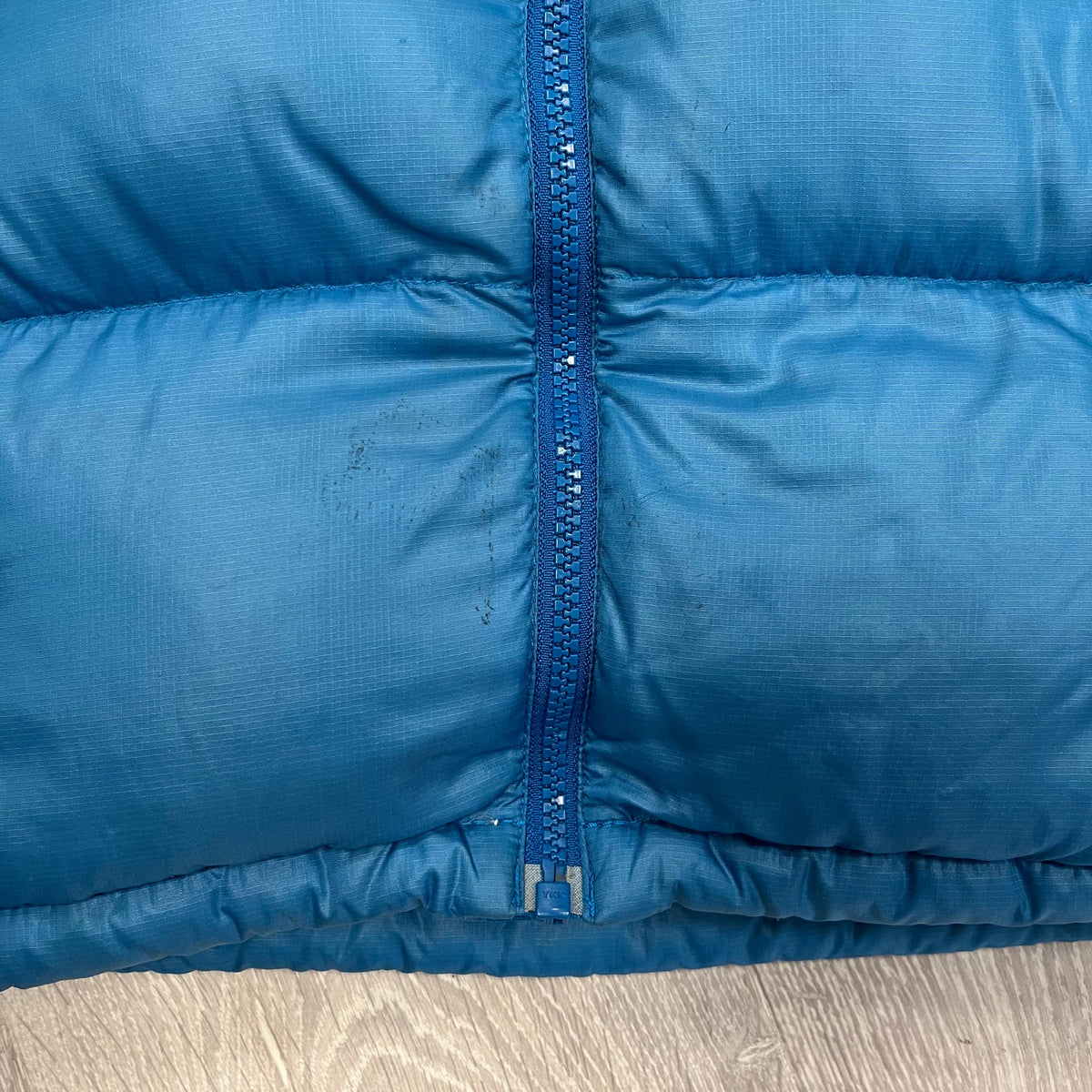 The North Face Baby Blue Puffer Jacket WITH STAIN