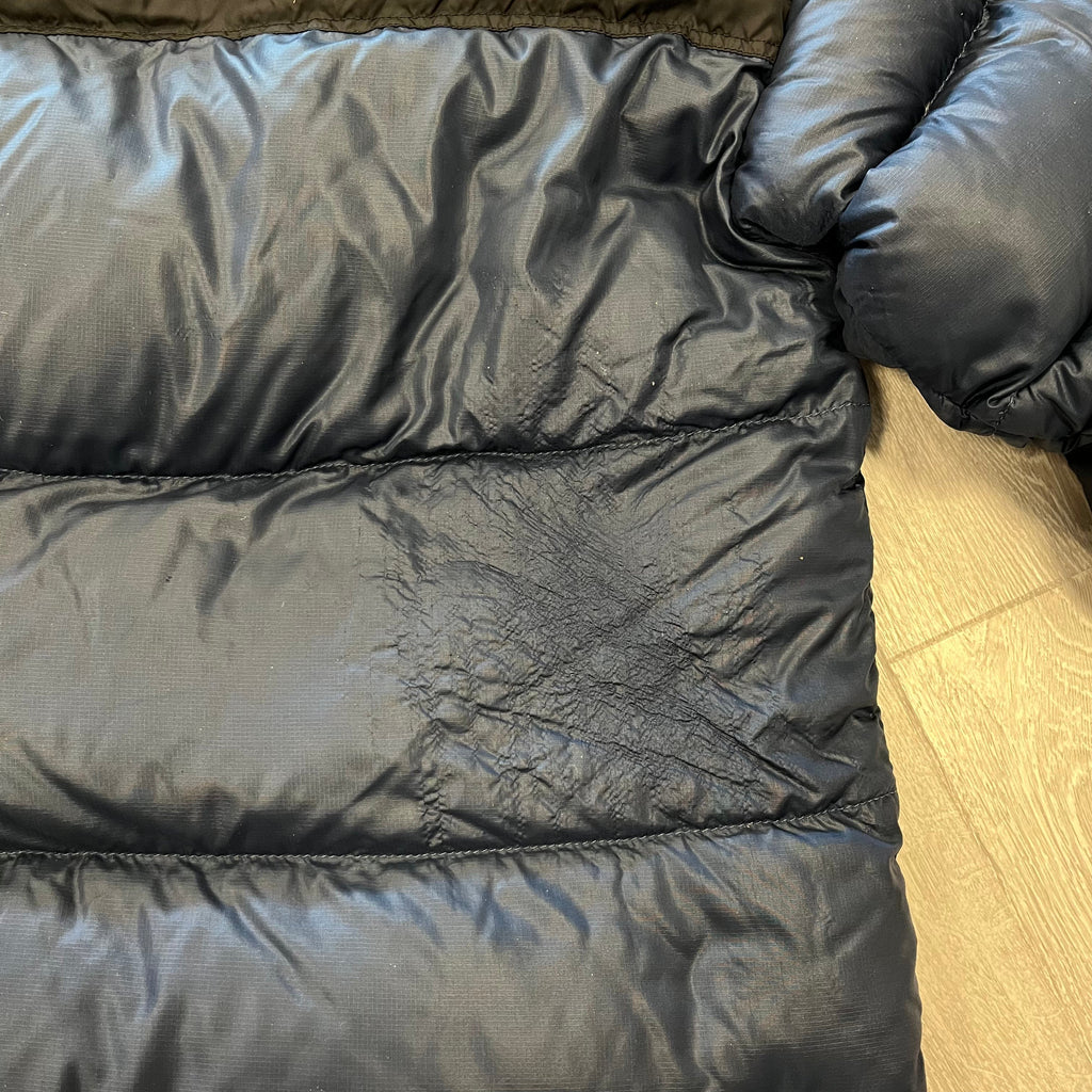 The North Face Navy Blue Puffer Jacket WITH DAMAGE